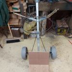 Golf trolley being converted 